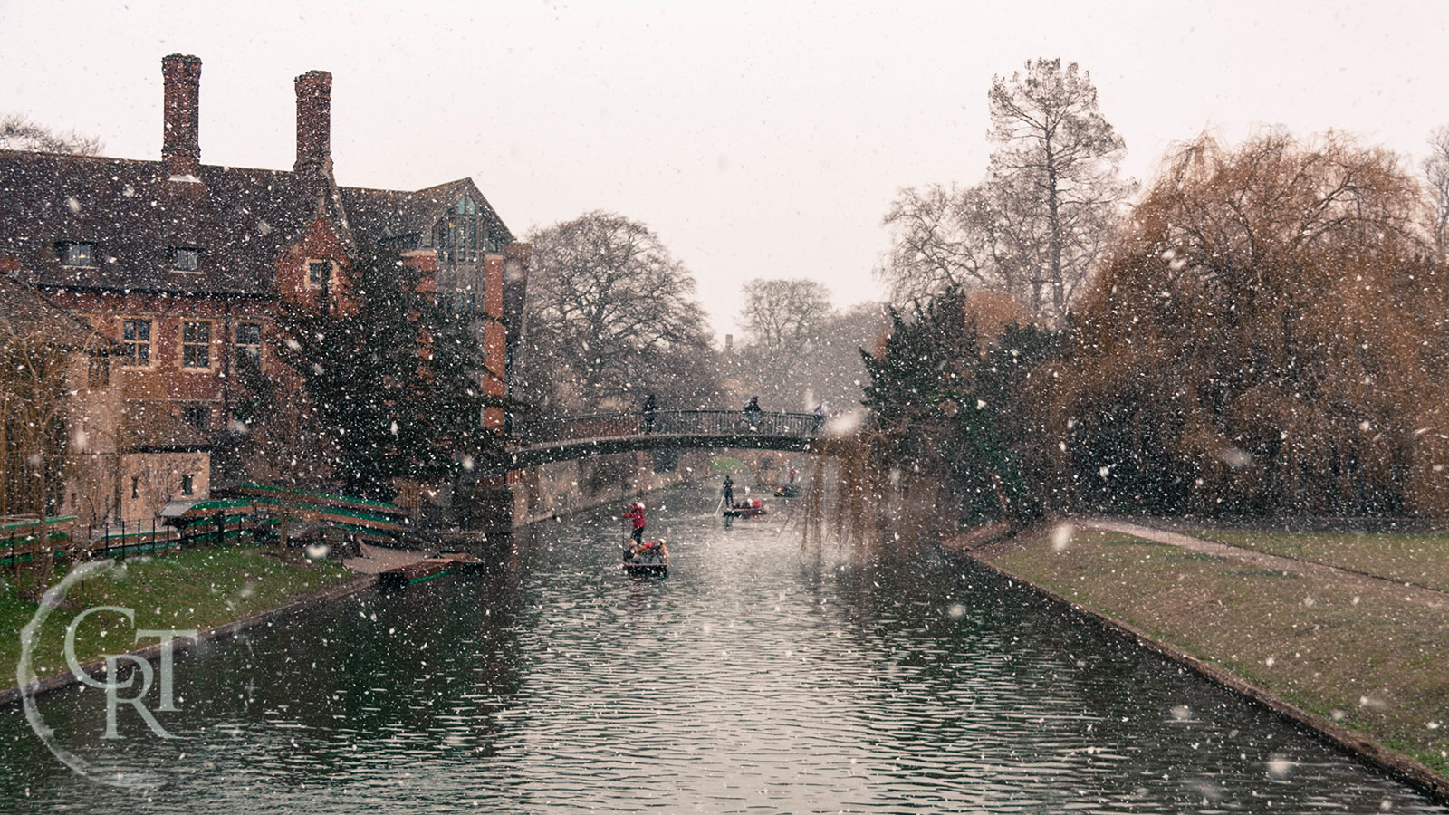 People punting in Cambridge in the snow
